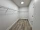 Large walk-in closet with double hanging rods at 37570 Teri Ct, Dade City, FL 33525