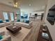 Open concept living room and kitchen with hardwood floors at 37570 Teri Ct, Dade City, FL 33525