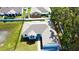 New construction home with a gray roof and stone accents at 37570 Teri Ct, Dade City, FL 33525
