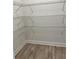 Walk-in pantry with wire shelving providing ample storage space at 37570 Teri Ct, Dade City, FL 33525