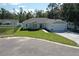 Single-Gathering home with a two-car garage and well-manicured lawn at 37570 Teri Ct, Dade City, FL 33525