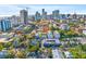Aerial view of a modern home with city views, rooftop patio, and lush landscaping at 103 5Th N Ave, St Petersburg, FL 33701