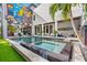 Enjoy a refreshing backyard pool, complete with a spa and modern art mural at 103 5Th N Ave, St Petersburg, FL 33701