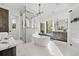 Luxurious bathroom with a freestanding tub, modern fixtures, and elegant design providing a spa-like experience at 103 5Th N Ave, St Petersburg, FL 33701