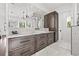 Stylish bathroom featuring dual sink vanity with marble counters, and modern fixtures adding a touch of luxury at 103 5Th N Ave, St Petersburg, FL 33701