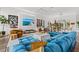 Spacious living room featuring stylish decor, modern furnishings, and plenty of natural light at 103 5Th N Ave, St Petersburg, FL 33701
