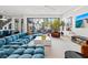 Bright and airy living room with stylish decor, large windows, and modern furniture at 103 5Th N Ave, St Petersburg, FL 33701