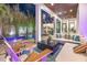 Outdoor living space with pool at night at 103 5Th N Ave, St Petersburg, FL 33701