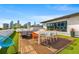 Inviting rooftop deck features an outdoor dining area with city views at 103 5Th N Ave, St Petersburg, FL 33701