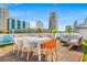 This rooftop deck features ample lounge seating for outdoor gatherings at 103 5Th N Ave, St Petersburg, FL 33701