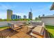 Expansive rooftop deck provides a relaxing atmosphere with outdoor seating and cityscape views at 103 5Th N Ave, St Petersburg, FL 33701