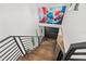 Modern staircase with dark wood steps and black metal railings at 103 5Th N Ave, St Petersburg, FL 33701
