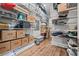 A storage room with racks and hardwood flooring at 103 5Th N Ave, St Petersburg, FL 33701