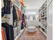 Spacious walk-in closet with custom shelving, hanging racks, and stylish decor providing ample storage at 103 5Th N Ave, St Petersburg, FL 33701