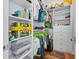 Organized walk-in closet with shelves, hanging rods, and storage containers at 103 5Th N Ave, St Petersburg, FL 33701