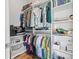 Organized walk-in closet with built-in shelving and hanging space at 103 5Th N Ave, St Petersburg, FL 33701