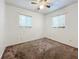 Simple bedroom offering neutral walls and carpeting, providing a versatile space for customization at 1318 Preston S St, St Petersburg, FL 33712