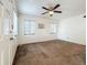 Spacious bedroom with neutral carpeting and ceiling fan at 1318 Preston S St, St Petersburg, FL 33712