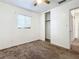 Bright bedroom with ceiling fan, closet and carpet floors at 1318 Preston S St, St Petersburg, FL 33712