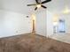 Bright living room with ceiling fan and neutral carpet at 1318 Preston S St, St Petersburg, FL 33712