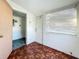 Laundry area with washer and dryer hookups, water heater, and electrical panel at 1318 Preston S St, St Petersburg, FL 33712