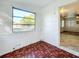 Sunroom with parquet flooring and large window at 1318 Preston S St, St Petersburg, FL 33712