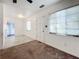 Bright living room with ceiling fan and neutral carpet at 1318 Preston S St, St Petersburg, FL 33712