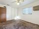 Spacious bedroom with ceiling fan, window coverings and carpet flooring at 1318 Preston S St, St Petersburg, FL 33712