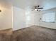 Bright living room with ceiling fan and neutral carpet at 1318 Preston S St, St Petersburg, FL 33712