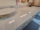 Close-up view of a kitchen counter with light-colored countertops at 4895 Bay Ne St # 215, St Petersburg, FL 33703