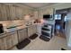 Updated kitchen with stainless steel appliances and wood cabinets at 4895 Bay Ne St # 215, St Petersburg, FL 33703