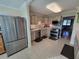 Updated kitchen with stainless steel appliances and wood cabinets at 4895 Bay Ne St # 215, St Petersburg, FL 33703