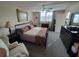 Spacious Primary bedroom with king-size bed and ample closet space at 4895 Bay Ne St # 215, St Petersburg, FL 33703