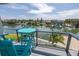 Relaxing balcony boasting water views and patio furniture at 12400 Capri N Cir # B, Treasure Island, FL 33706