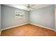 Bright bedroom with wood floors and a ceiling fan at 1265 Magnolia Dr, Clearwater, FL 33756