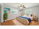 Spacious main bedroom with a comfortable bed and coastal decor at 1265 Magnolia Dr, Clearwater, FL 33756