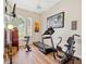 Spacious exercise room with large windows, providing natural light at 168 Rue Des Chateaux, Tarpon Springs, FL 34688