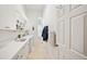 Bright laundry room with washer, dryer, sink, and ample counter space at 168 Rue Des Chateaux, Tarpon Springs, FL 34688