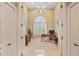 Home office with natural light, neutral walls, and a ceiling fan, perfect for remote work at 168 Rue Des Chateaux, Tarpon Springs, FL 34688