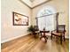 Bright sitting area with large arched window and classic decor at 168 Rue Des Chateaux, Tarpon Springs, FL 34688
