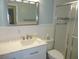 Clean bathroom, featuring a large vanity and shower at 3128 59Th S St # 209, Gulfport, FL 33707