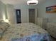 Spacious bedroom with a king-size bed and ample closet space at 3128 59Th S St # 209, Gulfport, FL 33707
