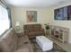 Comfortable living room with two recliners and a large TV at 3128 59Th S St # 209, Gulfport, FL 33707