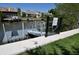 Community kayak launch on the water, with a kayak launch dock and railing at 4336 Bayside Village Dr # 201, Tampa, FL 33615