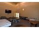 The recreation room has a ping pong table, foosball, and air hockey for the residents at 4336 Bayside Village Dr # 201, Tampa, FL 33615