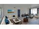 Bright living room with contemporary furnishings, neutral tones, and lots of natural light at 4336 Bayside Village Dr # 201, Tampa, FL 33615