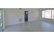 Spacious living room with neutral tones and a large window providing ample natural light at 4336 Bayside Village Dr # 201, Tampa, FL 33615