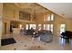 Spacious lounge area with high ceilings, chandelier, and comfortable seating at 4336 Bayside Village Dr # 201, Tampa, FL 33615