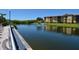 Scenic pond with a fountain, surrounded by well-manicured lawns and residential buildings at 4336 Bayside Village Dr # 201, Tampa, FL 33615