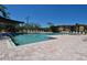 Community pool area with lounge chairs, perfect for relaxation and enjoying sunny days at 4336 Bayside Village Dr # 201, Tampa, FL 33615